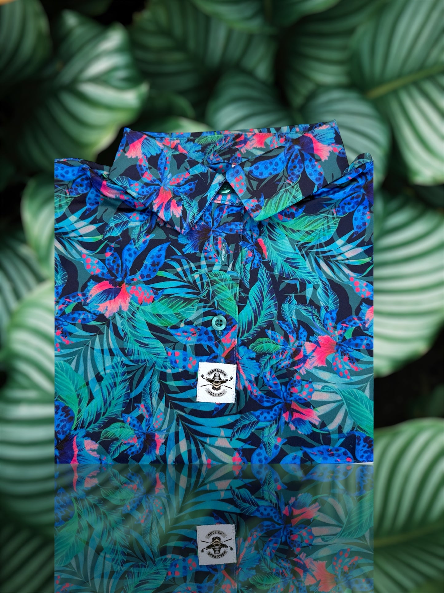 Polo femme Exotic  Forest sans manche